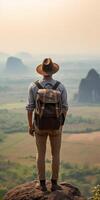 AI Generative Hiker hugging his backpack looking at the landscape photo