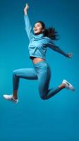 AI Generative Isolated happy athletic young woman on a blue background photo