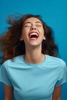 AI Generative Isolated happy funny woman having fun over a blue background Portrait of a positive joyful girl photo