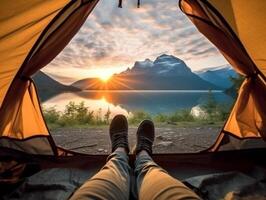 AI Generative POV view of hipster tourist inside tent in front of mountains landscape   Adventure hiking and wanderlust concept photo