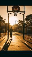 ai generativo calle baloncesto jugador haciendo un poderoso golpe remojar en el Corte atlético masculino formación al aire libre a puesta de sol deporte y competencia concepto foto