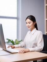 AI Generative beautiful Asian secretary writes to the computer  business concept  Asian people photo