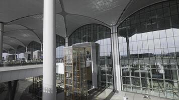 Turkey, Istanbul - July 20, 2022. Beautiful modern airport. Action. Stylish glass facade of modern building. Facade of new airport in Turkey. International airport on territory of European part of photo