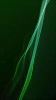 Vertical video - abstract motion background with an elegant flowing green digital fractal light wave and floating particles. This abstract technology concept background is full HD and a seamless loop.