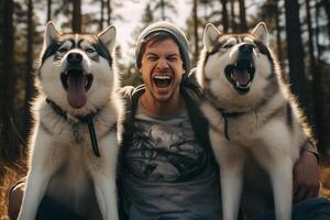 ai generado joven hombre riendo con dos perros esquimales perros bokeh estilo antecedentes con generativo ai foto