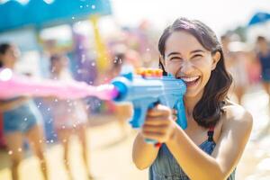 AI generated a woman playing water gun at songkran day with generative ai photo