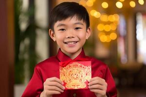 AI generated chinese young boy wearing traditional suit and holding aungpao bokeh style background with generative ai photo