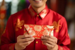 AI generated chinese man wearing traditional suit and holding aungpao bokeh style background with generative ai photo