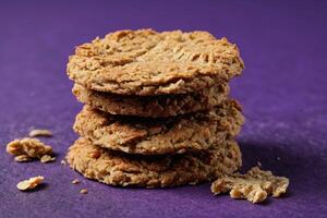 ai generado anzac galleta en púrpura antecedentes foto