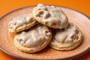 AI generated Biscuits and Gravy on Orange Background photo