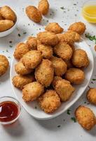 AI generated Breaded Chicken Bites Served with Sauce photo