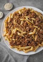 AI generated Savory Lentil Poutine on Fries photo