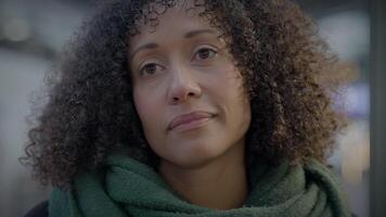 Thoughtful Woman with Braun Curly Hair Commuting in the City at Night video