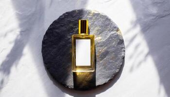 Mockup of galss transparent perfume bottle on stone plate and shadows photo