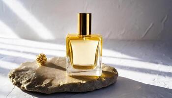 Mockup of galss transparent perfume bottle on stone plate and shadows photo