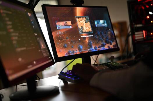 Gaming computer concept. Immersed in cyberspace, gamer navigates digital realm with precision, utilizing a desktop, keyboard, and monitor to play online games and embrace a world of technology. photo