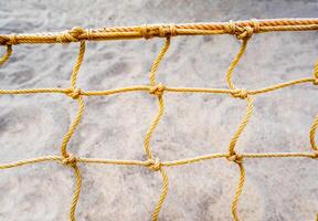 Mesh net of beach volleyball photo