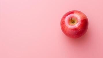 AI generated Red apple on pink background. Flat lay top view with copy space for text. photo