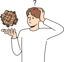 Confused man with wooden puzzle scratches head, wondering how to solve difficult problem. Thoughtful guy with puzzle needs help to find solution due to lack of necessary qualifications png