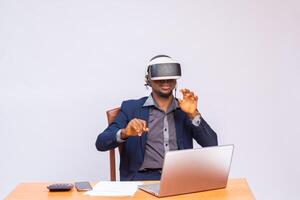 handsome african businessman i the office wearing vr photo