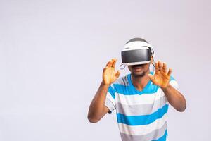 Young man using virtual reality headset. VR, future, gadgets, technology concept photo