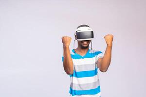 handsome Man using virtual reality simulator headset photo