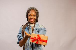 beautiful lady smiling at the gift she just received photo