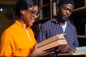 High school - two students with book in classroom photo