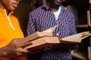 High school - two students with book in classroom photo