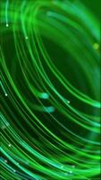 Vertical video - digital data motion background animation with a fast moving stream of green fiber optic light data nodes and particles. This modern technology background is full HD and looping.