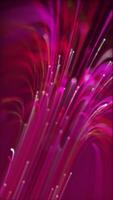 verticaal video - digitaal gegevens stromen achtergrond animatie met een snel in beweging stroom van roze vezel optiek licht gegevens knooppunten en deeltjes. deze abstract modern technologie achtergrond is vol hd en een lus maken.