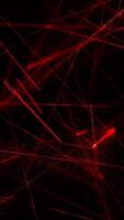 verticale video - raggiante rosso laser travi movimento sfondo con brillante che esplode particelle e lampeggiante veloce in movimento laser. Questo tecnologia sfondo animazione è pieno HD e un' senza soluzione di continuità ciclo continuo.