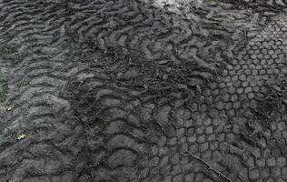 Texture Of Variety Wheels Traces On A Soil. Stock Photo for wallpaper or backgrounds