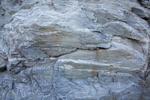 Close-up sharp cliff rock texture background image photo