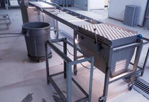 Egg candling machine on the farm hatchery industry. photo