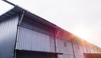 Industrial building with steel roof construction photo