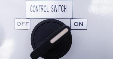 The Close up selector switch for control switching on the panel board. photo