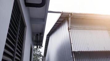 Industrial building with steel roof construction photo