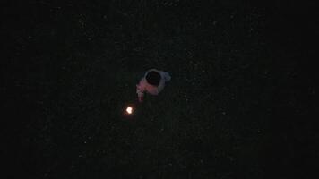 Young African Woman With Curly Hair Exploring Dark Night With Torch Light video