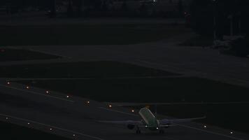 Aircraft departure at night, rear view video