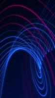Vertical video - elegant spiraling fractal light wave motion background animation with glowing pink and blue particles. Full HD and looping geometric background.