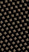 Vertical video - elegant Art Deco background animation with a repeating pattern of golden flourishes moving across the frame. This trendy motion background is full HD and a seamless loop