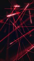 Vertical video - fast moving red laser beams technology motion background animation. Full HD and a seamless loop.