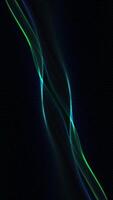 Vertical video - abstract motion background with a beautiful gently flowing blue and green digital fractal wave. This abstract technology concept background is full HD and a seamless loop.