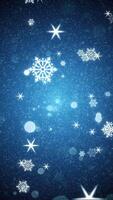 Vertical video - gently moving glowing white stars, spheres and snowflakes. Festive blue winter Christmas motion background animation.