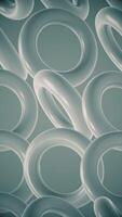 Vertical video - spinning torus tubes abstract motion background animation.