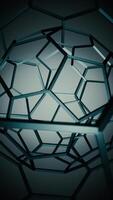 Vertical video - rotating dark metallic pentagon and hexagon shaped cage. Looping, full HD motion background.
