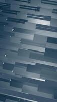 Vertical video - abstract, blue corporate or technology motion background animation - patterned effect with gently moving geometric shapes. Seamless loop and full HD.