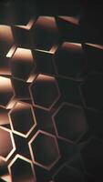 Vertical video - dark abstract geometric background with a pattern of rotating extruded hexagon shapes. Full HD and looping motion background animation.