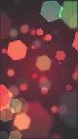 Vertical video - abstract colorful hexagons bokeh light particles motion background animation.